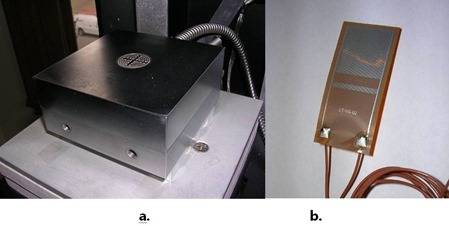 Figure 1--Reusable ceramic dielectric sensor in press platen and disposable dielectric sensor